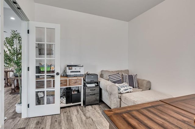 sitting room with light hardwood / wood-style flooring