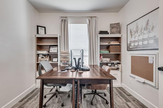 office space with hardwood / wood-style flooring