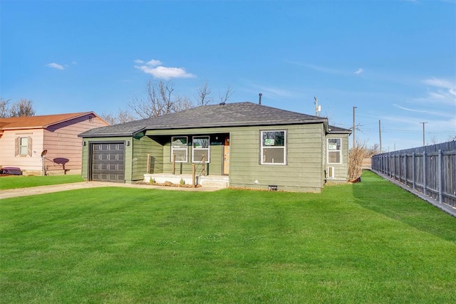 view of front of house with a garage and a front yard