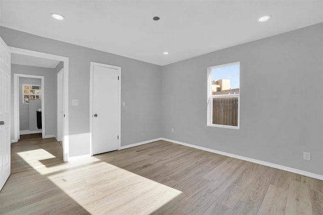 unfurnished room featuring light wood-type flooring