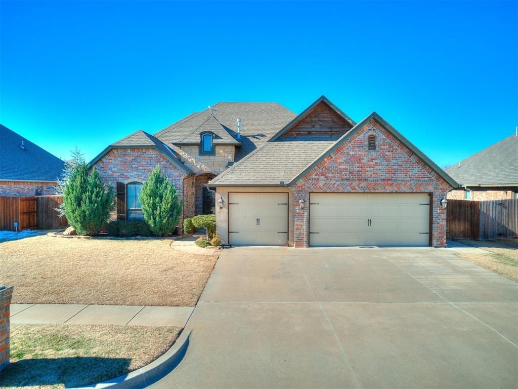 view of front of property with a garage