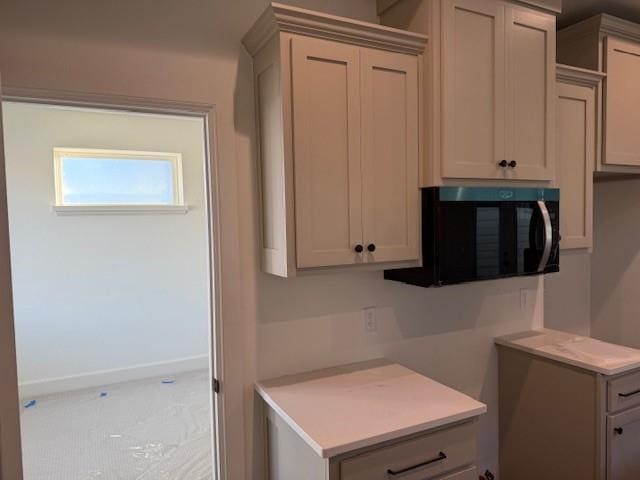 kitchen featuring gray cabinetry