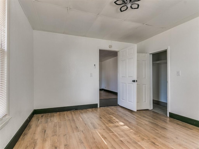 unfurnished bedroom with light hardwood / wood-style floors