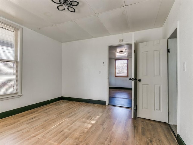 spare room featuring hardwood / wood-style floors