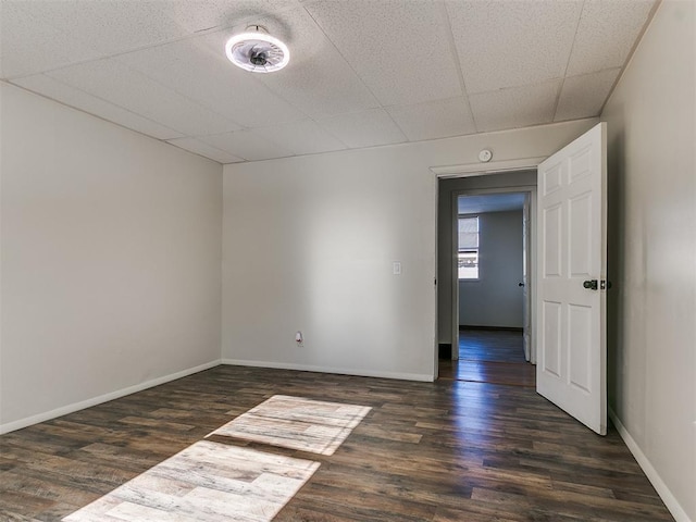 empty room with dark hardwood / wood-style floors