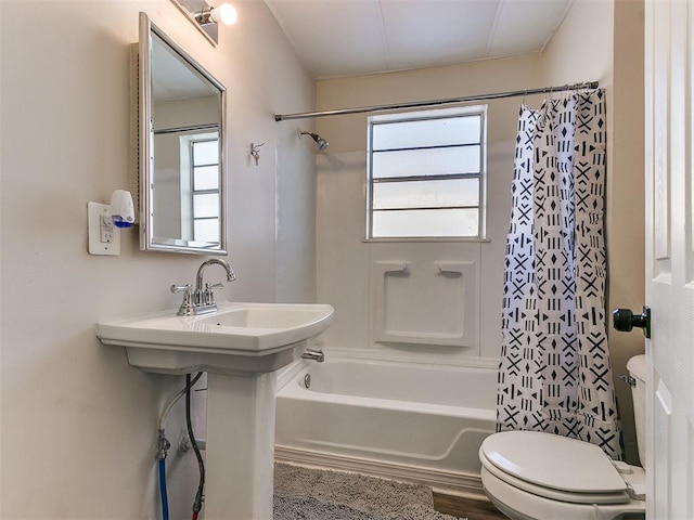 bathroom with toilet, shower / bathtub combination with curtain, and wood-type flooring