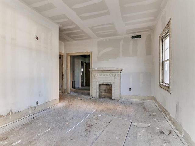 unfurnished living room with a fireplace