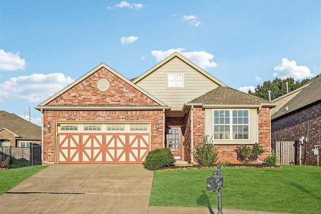 view of front of property featuring a garage and a front lawn