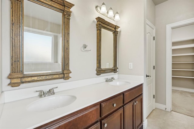 bathroom with vanity and tile patterned flooring