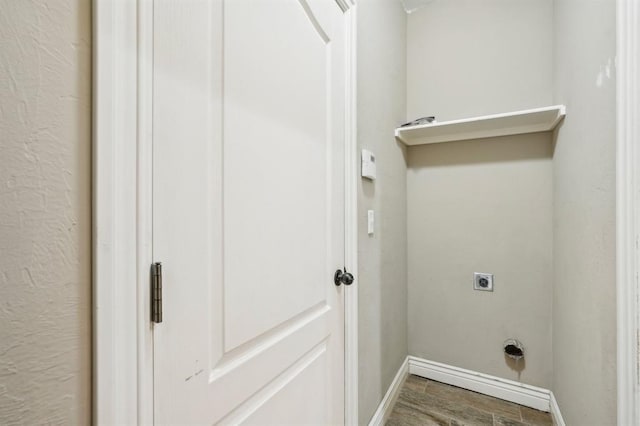 washroom featuring hookup for an electric dryer