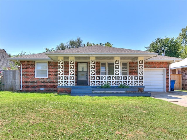 single story home with a front yard, a garage, and covered porch