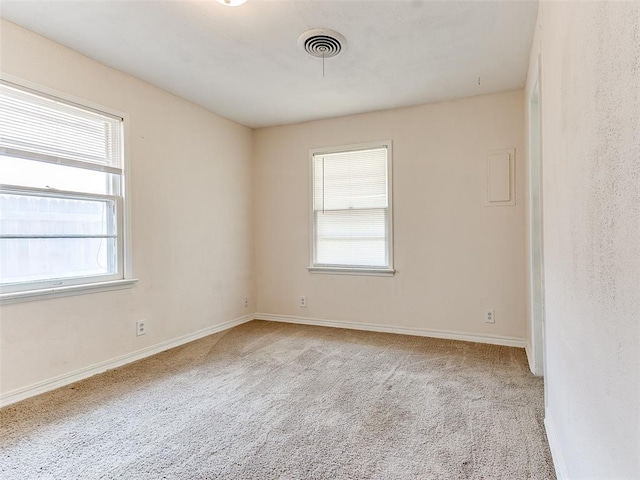 view of carpeted spare room