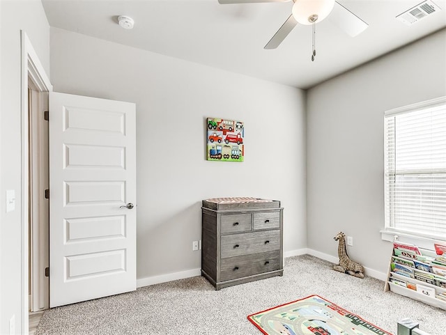 carpeted bedroom featuring ceiling fan