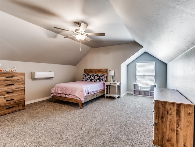 carpeted bedroom with ceiling fan, a wall unit AC, and vaulted ceiling