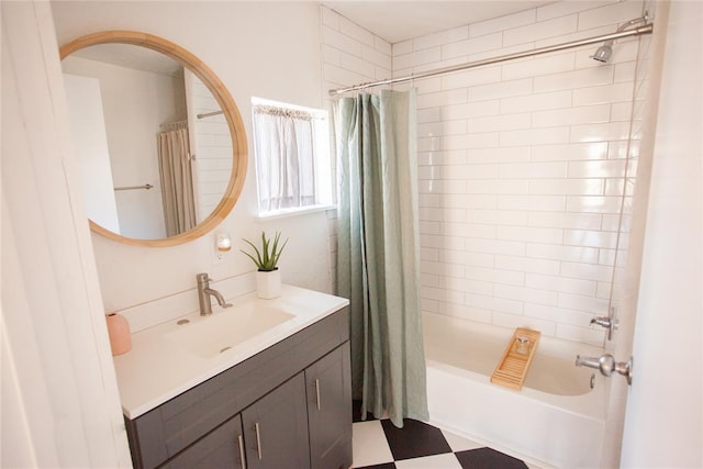 bathroom featuring vanity and shower / bath combo with shower curtain