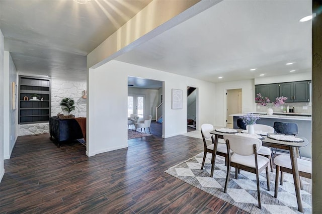 dining space featuring built in features