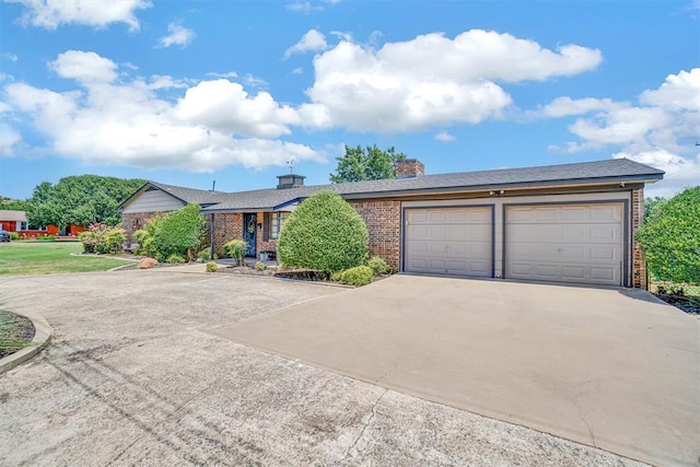 single story home featuring a garage