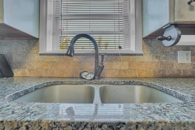 details with sink and decorative backsplash