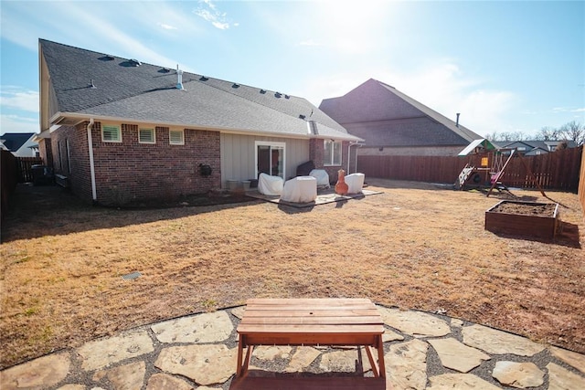 back of house featuring a patio area