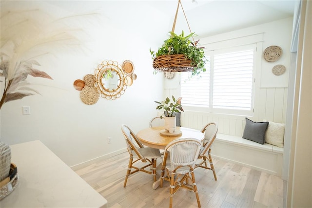 dining space featuring light wood-type flooring