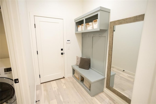 mudroom featuring washer / clothes dryer and light wood-type flooring