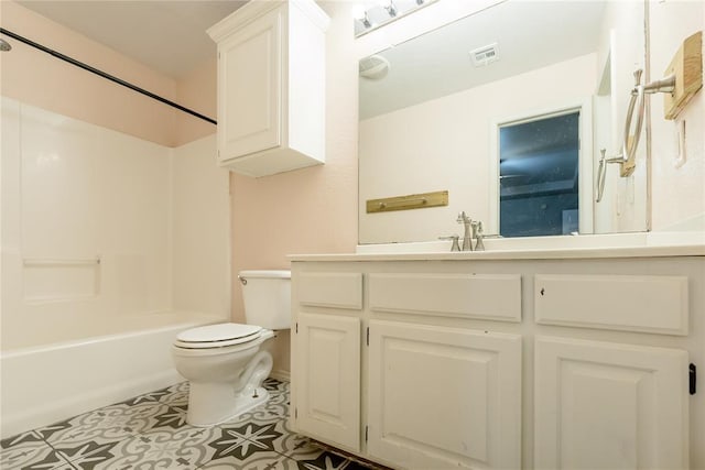 full bathroom featuring vanity, tile patterned floors, shower / bathtub combination, and toilet