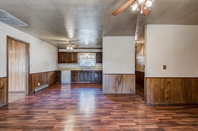 kitchen featuring baseboard heating, dishwasher, sink, dark hardwood / wood-style floors, and ceiling fan