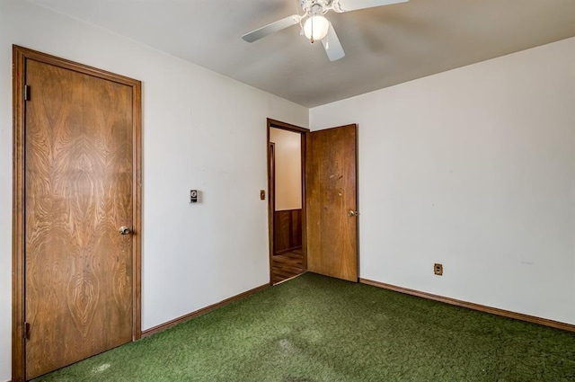 unfurnished bedroom with ceiling fan and carpet floors