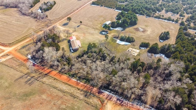 birds eye view of property featuring a rural view