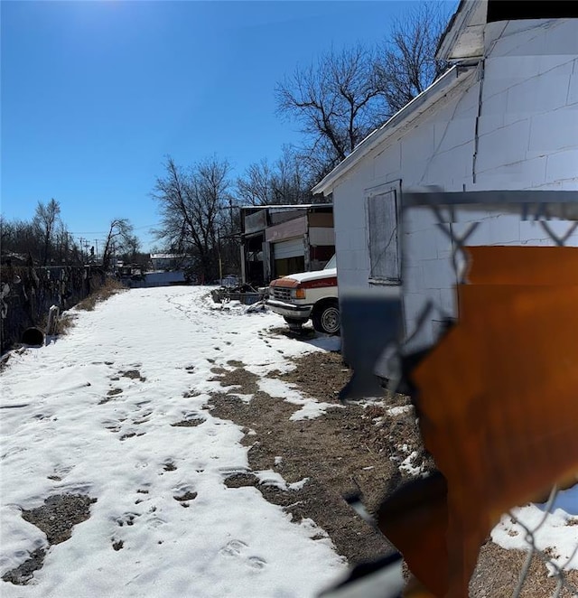 view of yard layered in snow