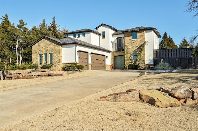 view of front of property featuring a garage