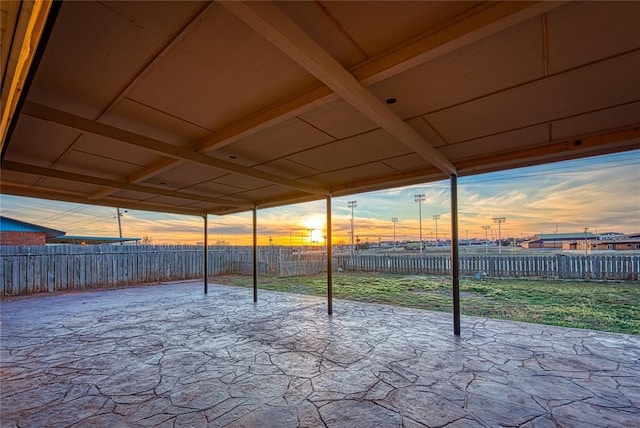 view of patio terrace at dusk