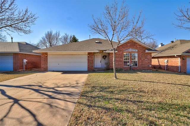 ranch-style house with a garage and a front lawn