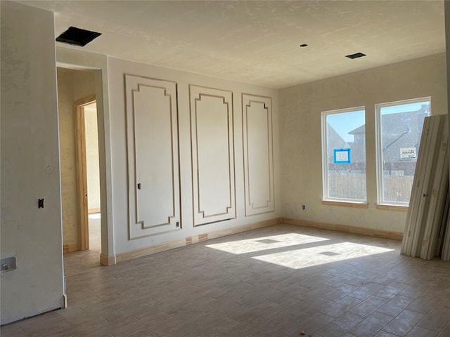 unfurnished bedroom featuring two closets and light hardwood / wood-style floors