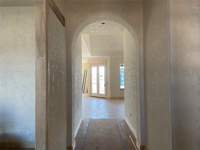 corridor featuring french doors