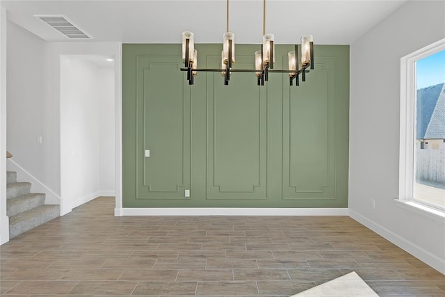 interior space with a chandelier
