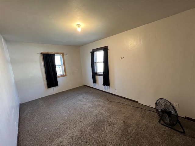 unfurnished room with carpet flooring