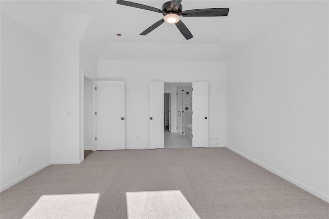 unfurnished bedroom featuring light carpet and ceiling fan