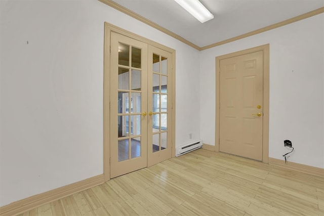 unfurnished room with ornamental molding, baseboard heating, light wood-type flooring, and french doors