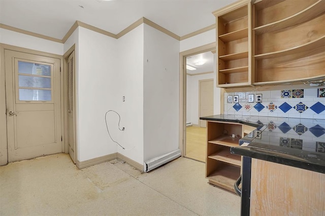 kitchen featuring ornamental molding and decorative backsplash