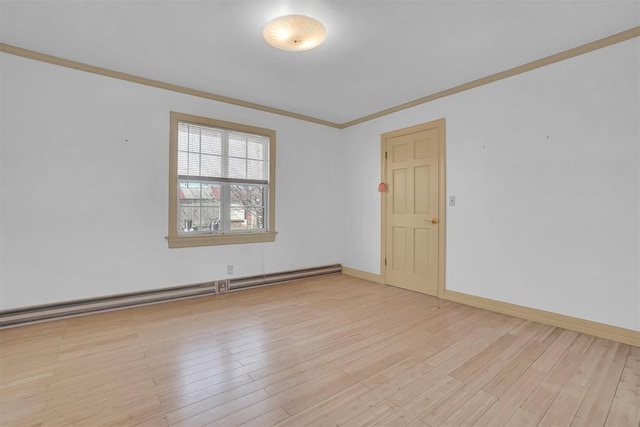 empty room featuring light wood-type flooring, crown molding, and a baseboard radiator