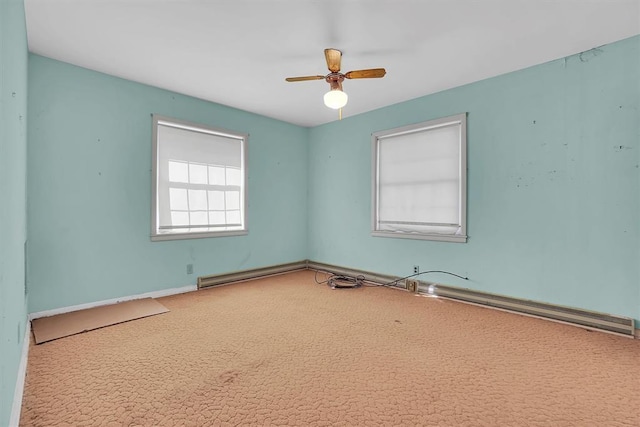 carpeted empty room with ceiling fan