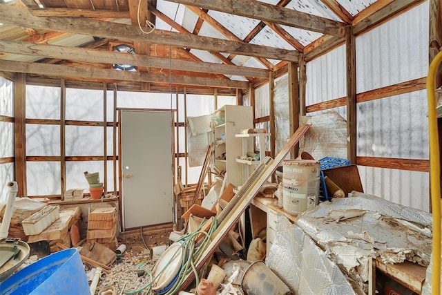 misc room featuring lofted ceiling