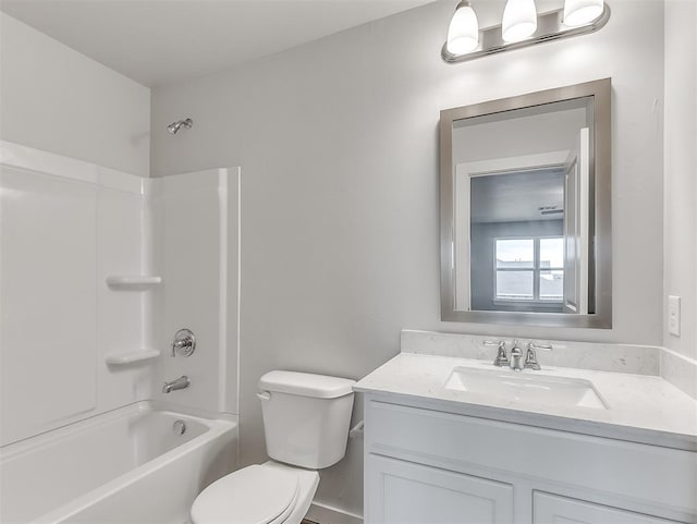 full bathroom featuring toilet, shower / washtub combination, and vanity