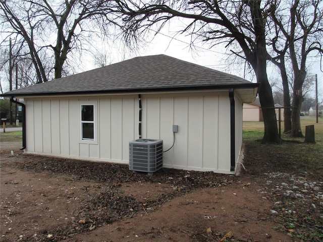 view of outdoor structure featuring central AC