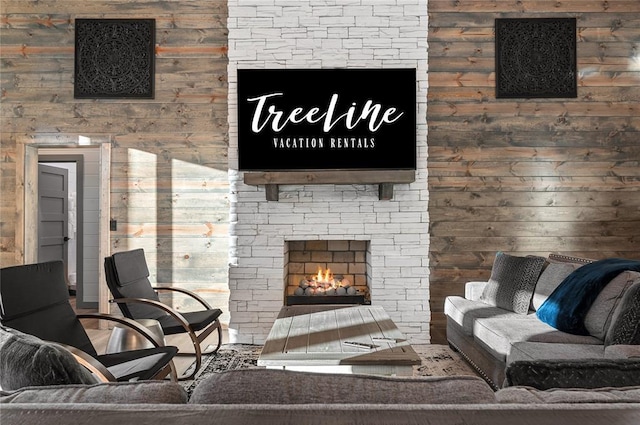 living room featuring a fireplace