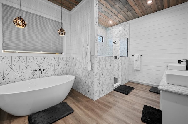 bathroom with vanity, a bathtub, wood ceiling, and wood-type flooring