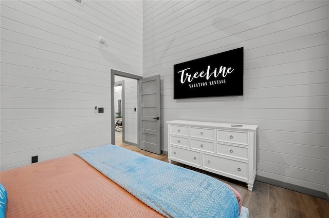 bedroom featuring hardwood / wood-style floors