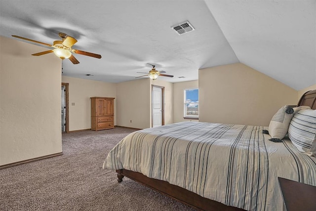 carpeted bedroom with ceiling fan, lofted ceiling, and a textured ceiling