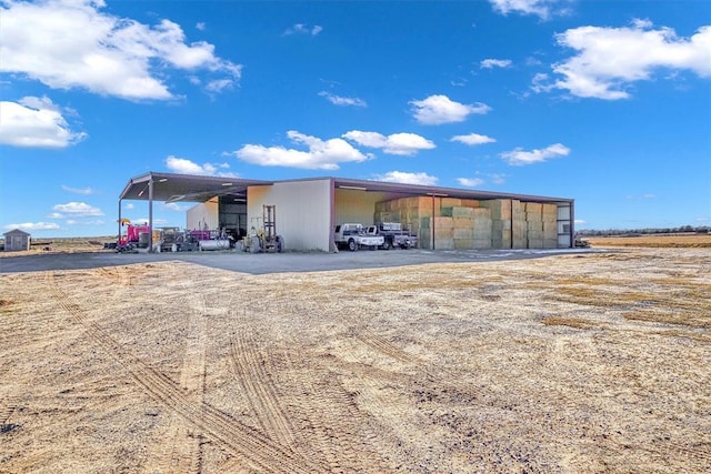 view of outdoor structure with a carport